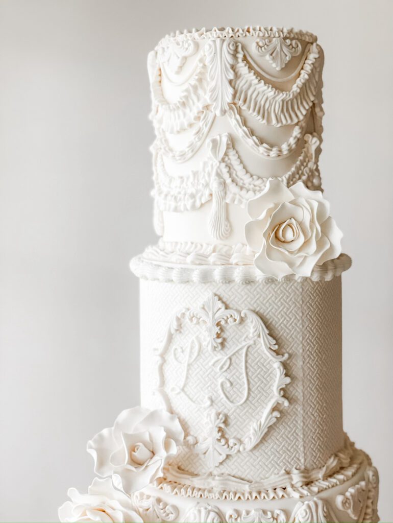 elegant custom fondant wedding cake with sugar flowers by Dolce Designs in Houston 